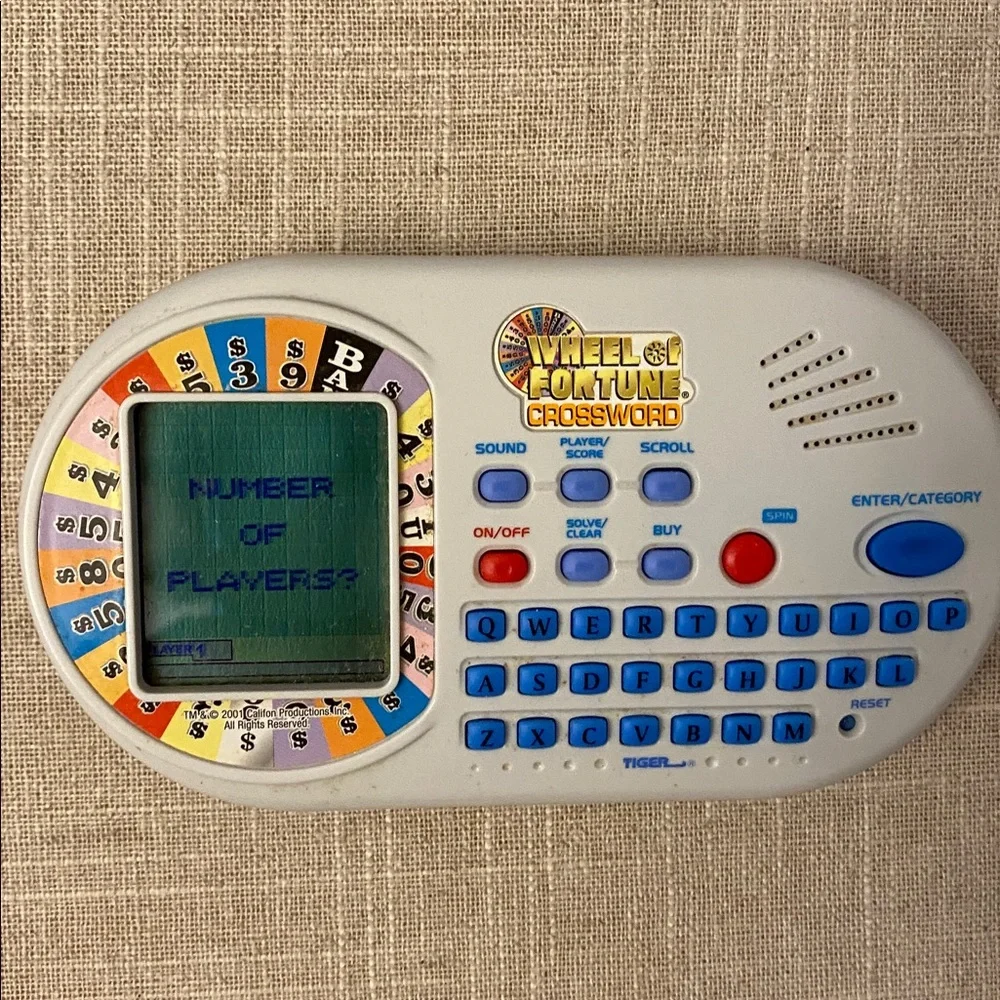 Wheel of Fortune Crossword Electronic Handheld Travel Game - White